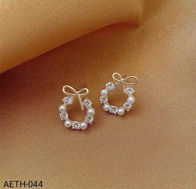 AETH044  Pearl Bow Tops Pair